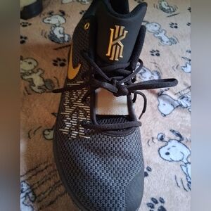Nike Kyrie Black and Gold Athletic Shoes